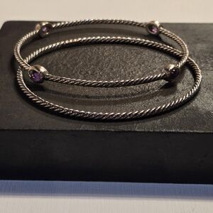 Pair of David Yurman cable bangle bracelets sterling silver one with amethysts